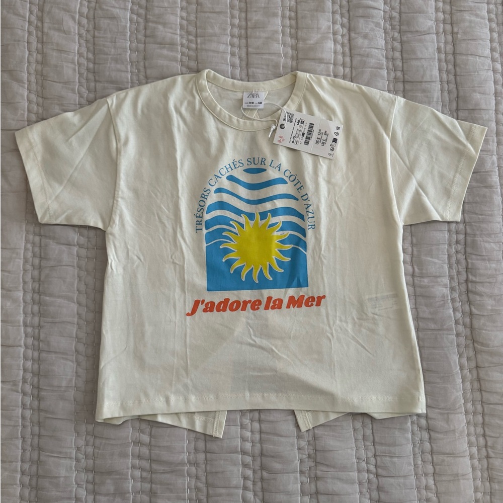 Zara - Size 9-10 - Cream T-Shirt with Sun Graphic